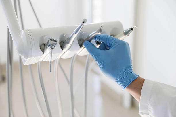 Professional Tooth Extraction technician working in Atkins, AR
